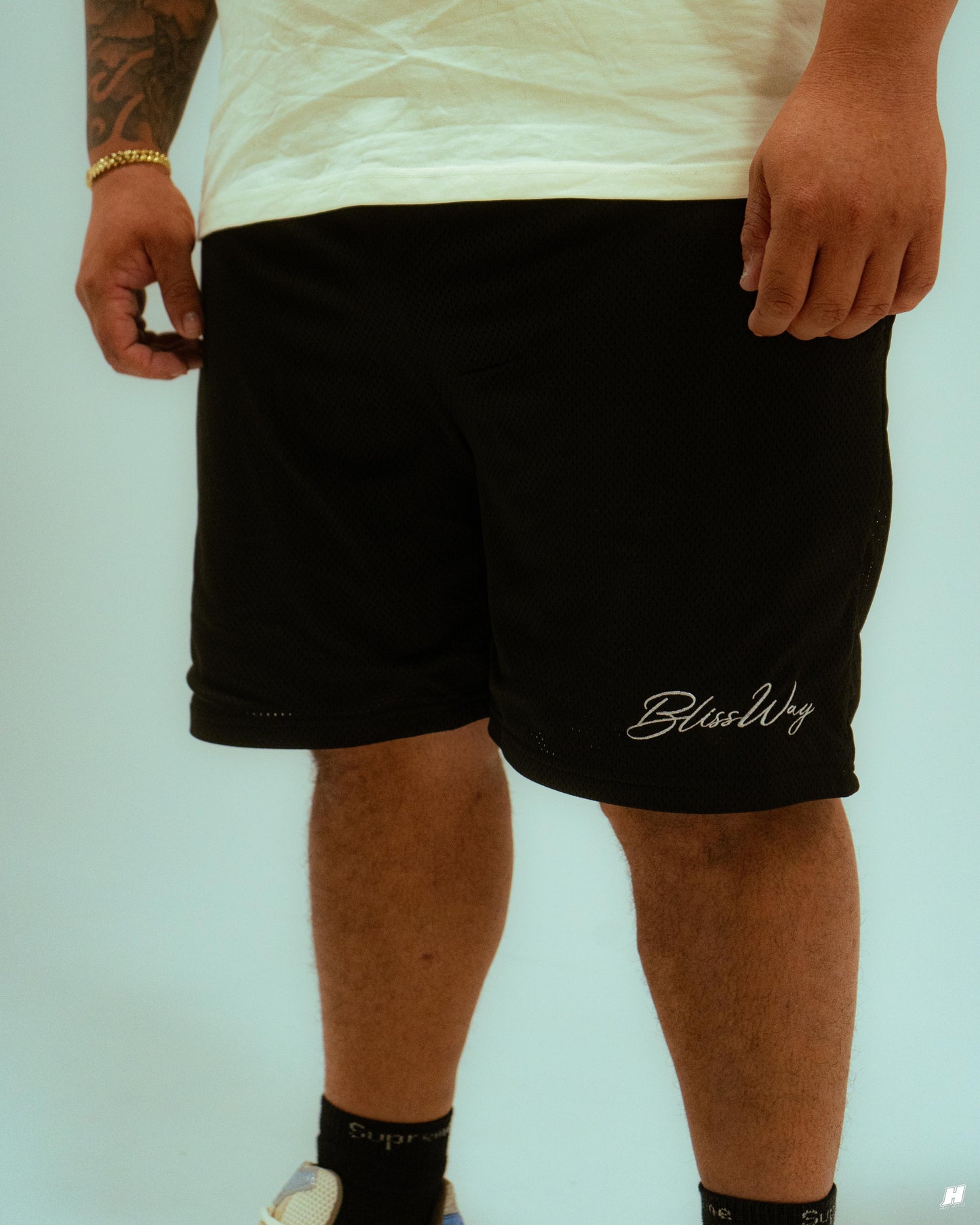 Pantalón corto de malla Signature